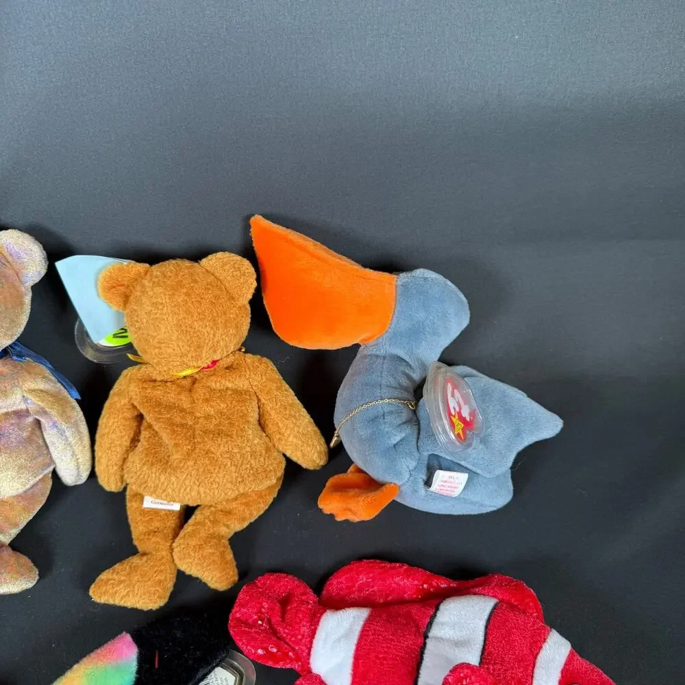 Lot of 8 Ty Beanie Babies Bears Fish Butterfly Dog Plush With Tags Retired